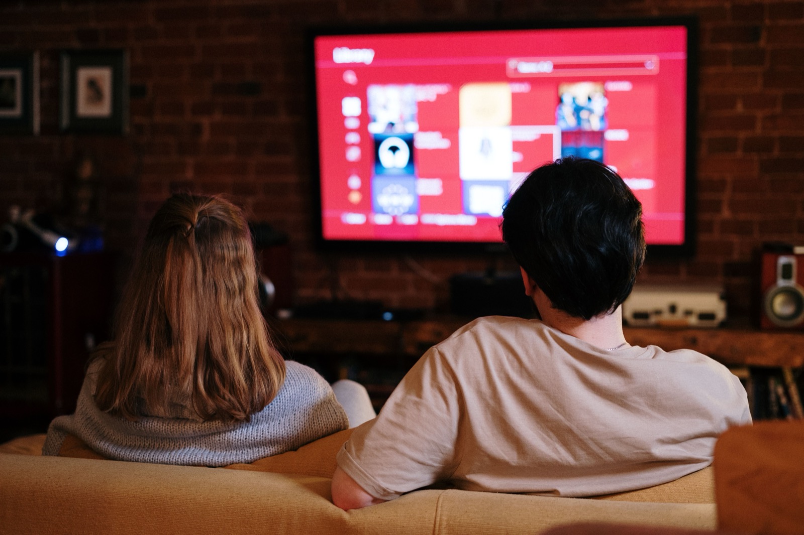 Family choosing an IPTV UK subscription plan on a laptop at home